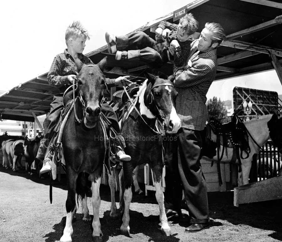 Beverly Park Ponyland 1947 Dan Duryea lifting his sons wm.jpg
